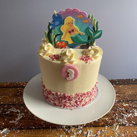 Tall Tier Mermaid Themed Birthday Cake with Pink Sprinkles