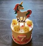 Tall tier buttercream unicorn cake